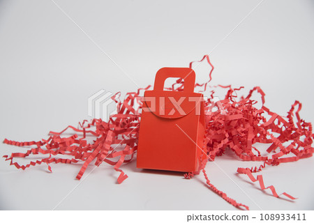 one red present box on white background, holidays concept one red present box on white background, holidays concept 108933411