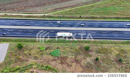 Arial view of Modern transportation with Expressway Road highway Top view. Important infrastructure. Arial view of Modern transportation with Expressway Road highway Top view. Important infrastructure. 108933968
