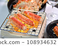 Grilled red king crab 108934632