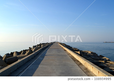Baltiysk, Kaliningrad region, Southern pier on the Baltic spit, concrete breakwaters Baltiysk, Kaliningrad region, Southern pier on the Baltic spit, concrete breakwaters 108934995