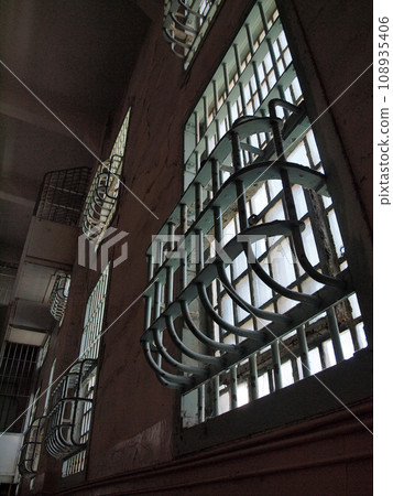 Metal bars on windows on Alcatraz Prison 108935406