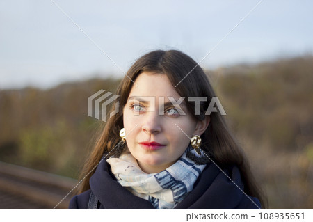 Closeup portrait beautiful young girl of the railway - depression, peace 108935651