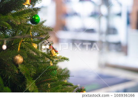 various Christmas decorations on the tree, decorations 108936166