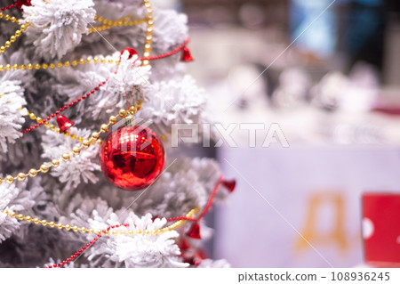various Christmas decorations on the tree, decorations 108936245