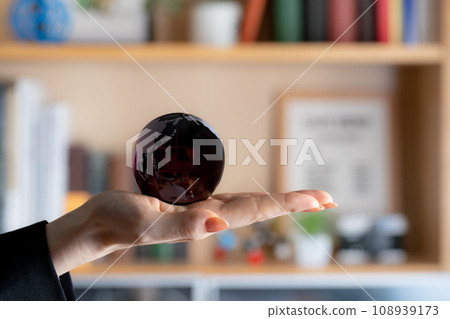Craft image of bookshelf and hand-held earth Craft image of bookshelf and hand-held earth 108939173