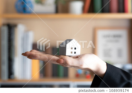 Craft image of bookshelf and handmade house 108939174