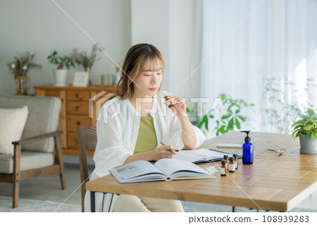 Women who enjoy aromatherapy 108939283