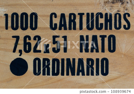 Wood texture background from army ammunition wooden crate with Spanish text - 1000 cartridges 7.62x51 Wood texture background from army ammunition wooden crate with Spanish text - 1000 cartridges 7.62x51 108939674