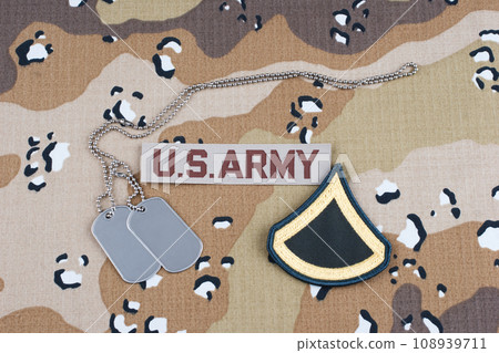 US ARMY Private First Class rank patch and dog tags on Desert Battle Dress Uniform 108939711