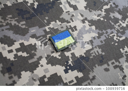 KYIV, UKRAINE - October 5, 2022. Russian invasion in Ukraine 2022. Ukraine Army Flag Patch uniform shoulder sleeve insignia badge. 108939716