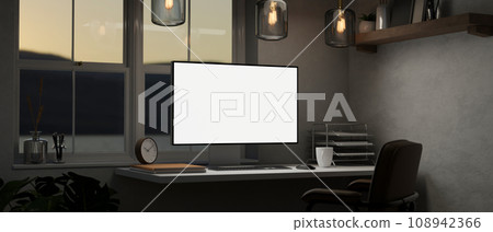 A modern private office workspace with a white-screen computer mockup on a table against the window. A modern private office workspace with a white-screen computer mockup on a table against the window. 108942366