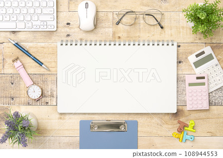 Notebook on desk overhead shot Notebook on desk overhead shot 108944553
