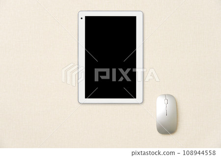 Overhead shot of tablet on desk Overhead shot of tablet on desk 108944558