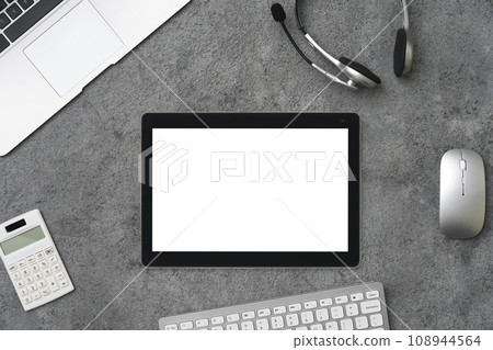 Overhead shot of tablet on desk 108944564