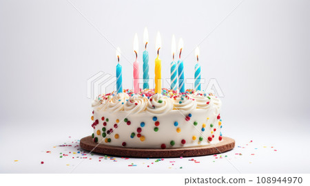 Cake with birthday candles on white background Cake with birthday candles on white background 108944970