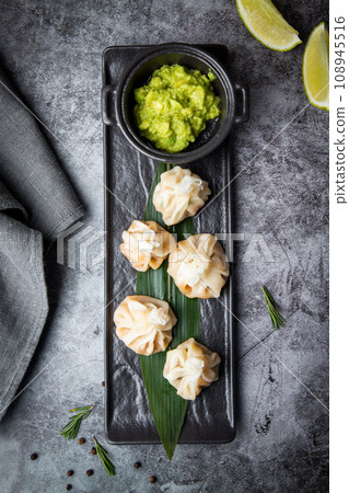 manti - baked pie with beef in national oriental style 108945516