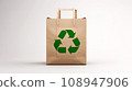 paper bag with a recycling symbol promotes the idea of eco-conscious packaging and recyclability. 108947906