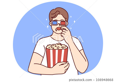 Man in 3D glasses eating popcorn 108948668