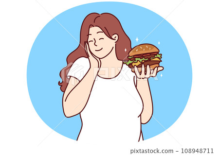 Smiling overweight woman with burger 108948711