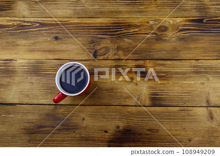 Cup of coffee on the wooden table. Top view, copy space Cup of coffee on the wooden table. Top view, copy space 108949209