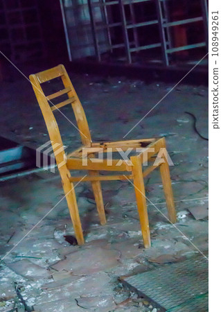 Broken chair in the abandoned building in Chernobyl exclusion zone, Ukraine Broken chair in the abandoned building in Chernobyl exclusion zone, Ukraine 108949261