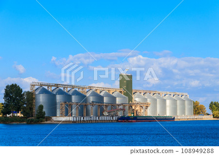 Modern granaries for storing cereal grains on a bank of the Dnieper river Modern granaries for storing cereal grains on a bank of the Dnieper river 108949288