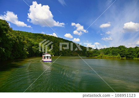 Brno Dam - Czech Republic. Beautiful Czech landscape with forests, lake and blue sky. Recreational area for sports and entertainment. Brno Dam - Czech Republic. Beautiful Czech landscape with forests, lake and blue sky. Recreational area for sports and entertainment. 108951123