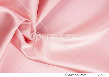 Pink fabric texture as a background. Pink fabric texture as a background. 108951535