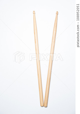 Wooden drum sticks on white background. 108952051