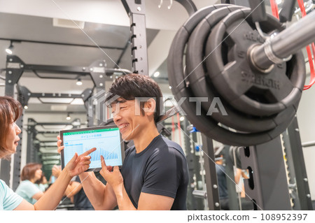 Receive instruction from an instructor while looking at a tablet 108952397