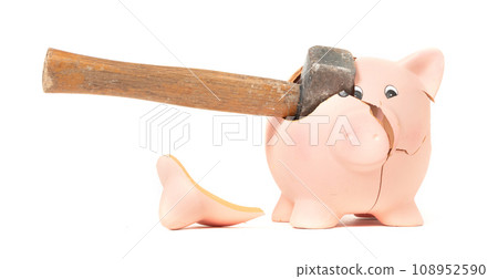 Hammer breaking piggy bank isolated Hammer breaking piggy bank isolated 108952590