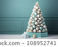 Christmas tree, with turquoise and white balls and boxes with gifts in a bright room 108952741