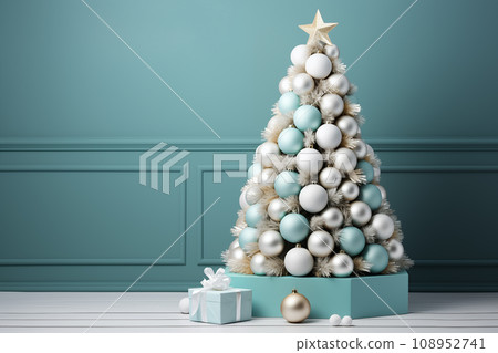 Christmas tree, with turquoise and white balls and boxes with gifts in a bright room 108952741