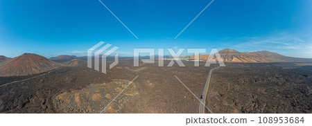 Panoramic drone picture over the barren volcanic Timanfaya National Park on Lanzarote Panoramic drone picture over the barren volcanic Timanfaya National Park on Lanzarote 108953684