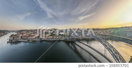 Drone panorama over the city of Porto and the Douro River at sunrise Drone panorama over the city of Porto and the Douro River at sunrise 108953701