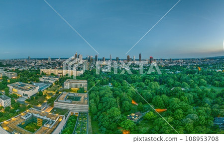 Wide angle drone panorama over the German city Frankfurt am Main during sunset Wide angle drone panorama over the German city Frankfurt am Main during sunset 108953708