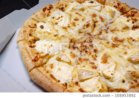 Piping hot pizza with melted cheese Piping hot pizza with melted cheese 108953892