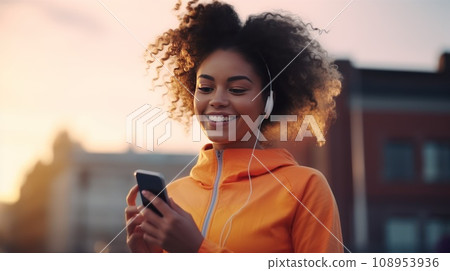 Young Caucasian man during a running workout in the summer park. Young Caucasian man during a running workout in the summer park. 108953936