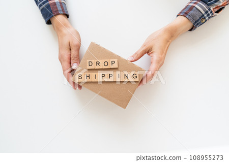 Drop shipping concept - hands holding carton box 108955273