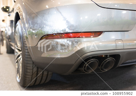 The Sleek and Shiny Rear of a Silver Sports Car, a Modern Marvel of Electric Mobility The Sleek and Shiny Rear of a Silver Sports Car, a Modern Marvel of Electric Mobility 108955902