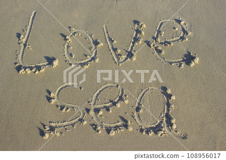 Lettering love sea on sand sunrise background sea, beach dawn Lettering love sea on sand sunrise background sea, beach dawn 108956017