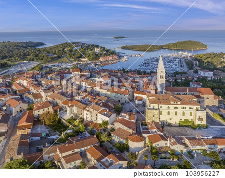 Panoramic drone picture of the Croatian harbor town of Vrsar on the Limski Fjord from the church bell tower 108956227