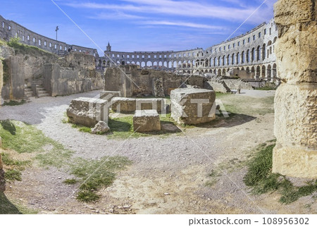 View inside the Roman amphitheater in the Croatian city of Pula without people View inside the Roman amphitheater in the Croatian city of Pula without people 108956302