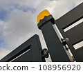 Automatic modern gates against the sky 108956920