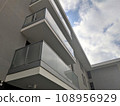 Modern residential building with balconies 108956929