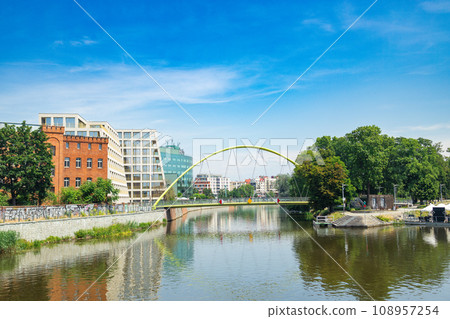 Wroclaw, Poland - June 2023: Beautiful, modern business office on the island. Wroclaw. Poland. Wroclaw, Poland - June 2023: Beautiful, modern business office on the island. Wroclaw. Poland. 108957254
