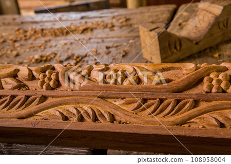 magnificent pattern carved from wood in a Tanzanian workshop 108958004