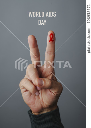 V sign and text world aids day 108958571