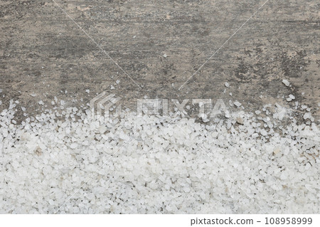 Background from white sea salt. Coarse rock salt texture witth copy space Background from white sea salt. Coarse rock salt texture witth copy space 108958999