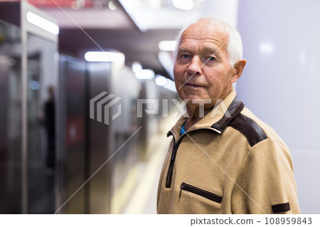 Old man in subway station 108959843